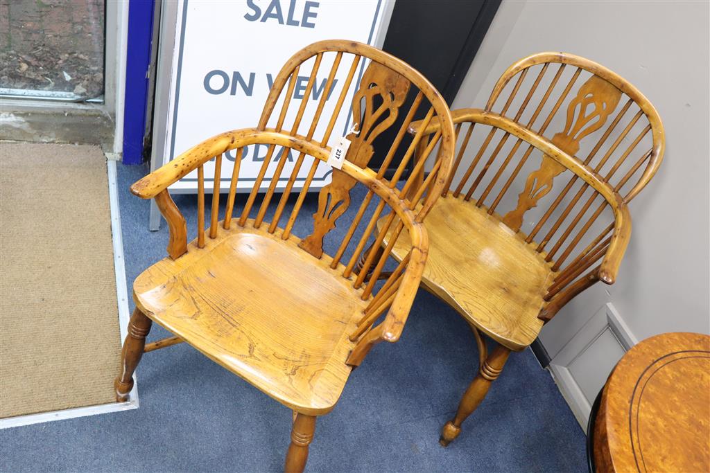 A pair of reproduction yew and elm Windsor elbow chairs